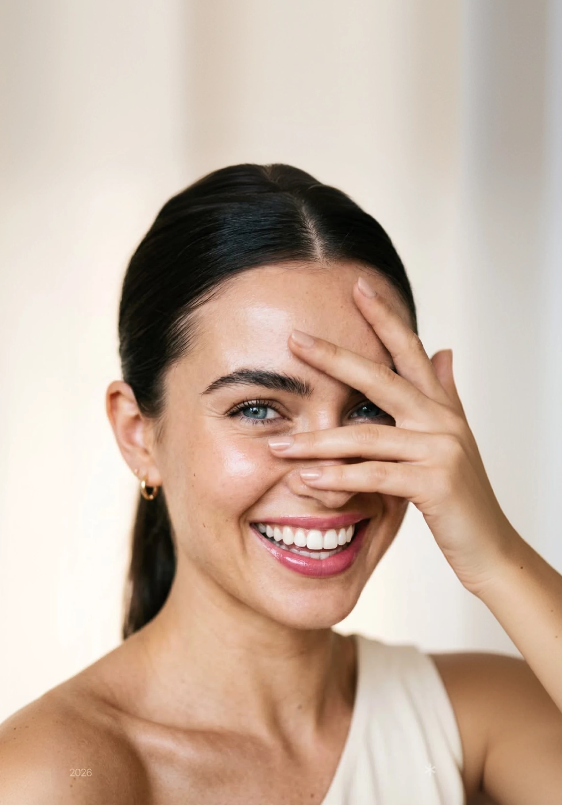 Client with radiant, healthy skin after a treatment at Prime Clinics
